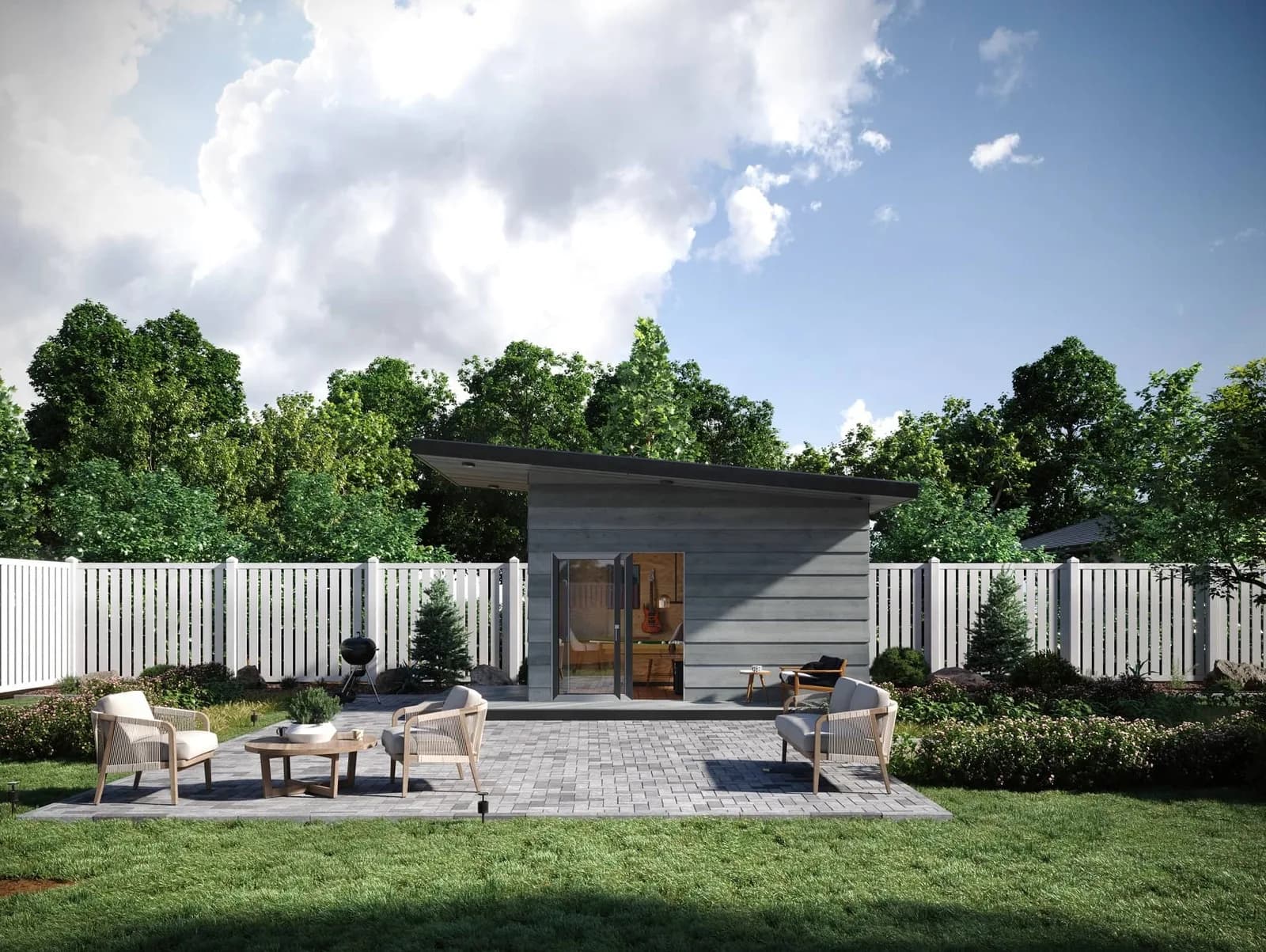 Modern backyard office shed with glass doors in a landscaped backyard