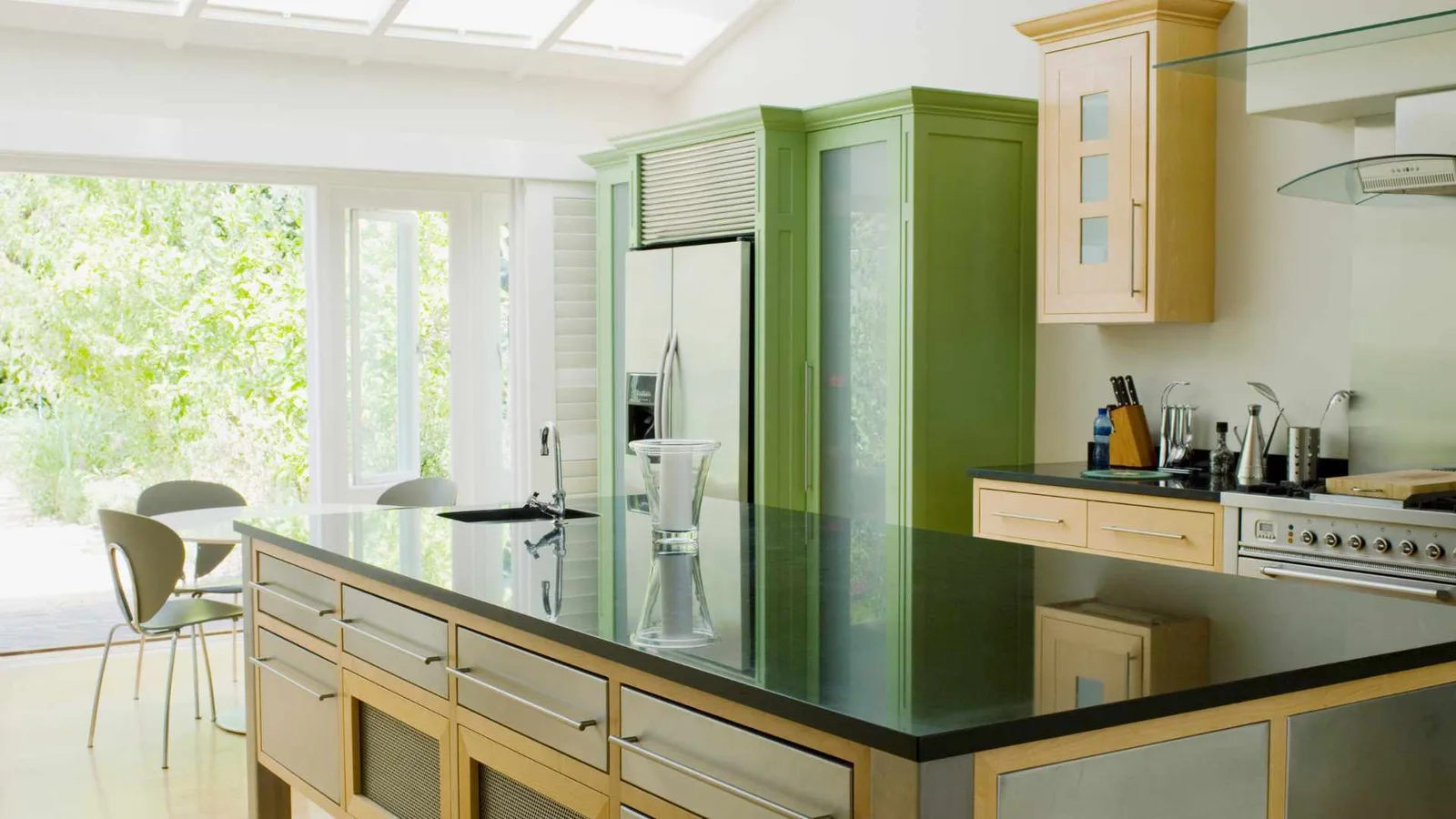 Colorful ADU kitchen with bold accent walls
