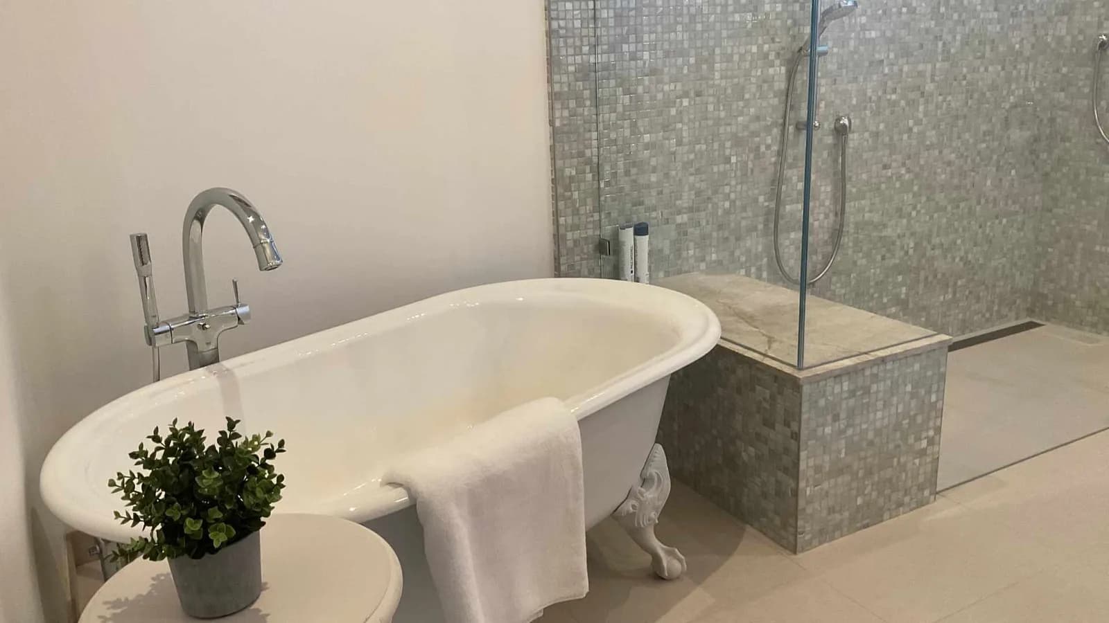 luxury bathroom with curb free shower