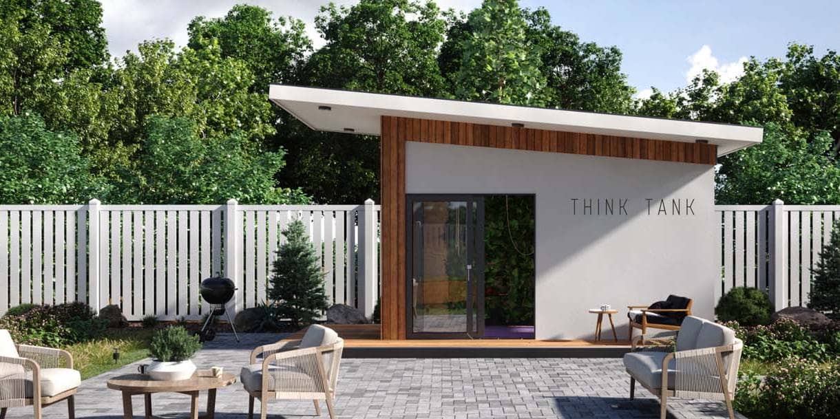 Modern backyard office shed with cedar accent and glass doors in a landscaped backyard