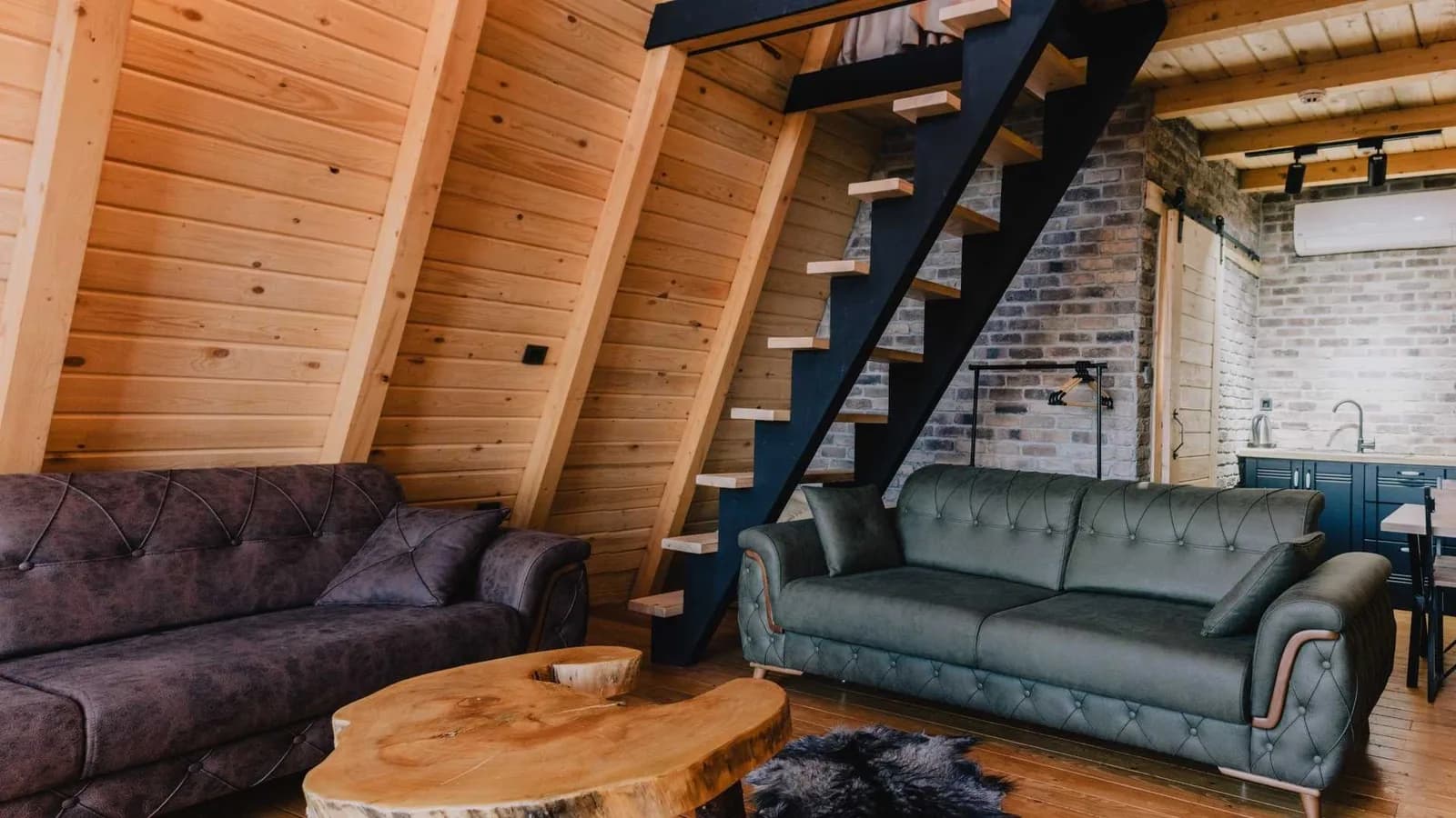 Backyard cabin ideas inside an A-frame cabin