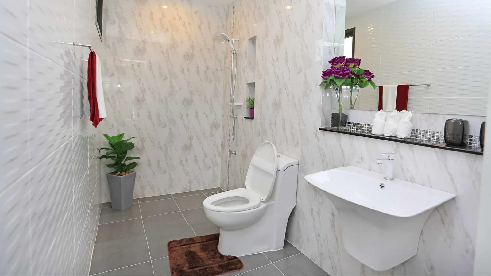 bathroom with two types of tiles