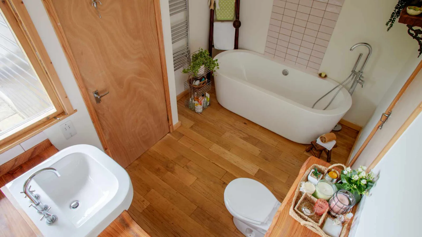 small bathroom with wooden floors