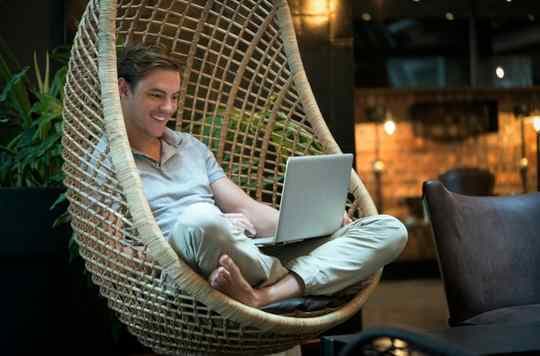 swinging backyard chair by home office